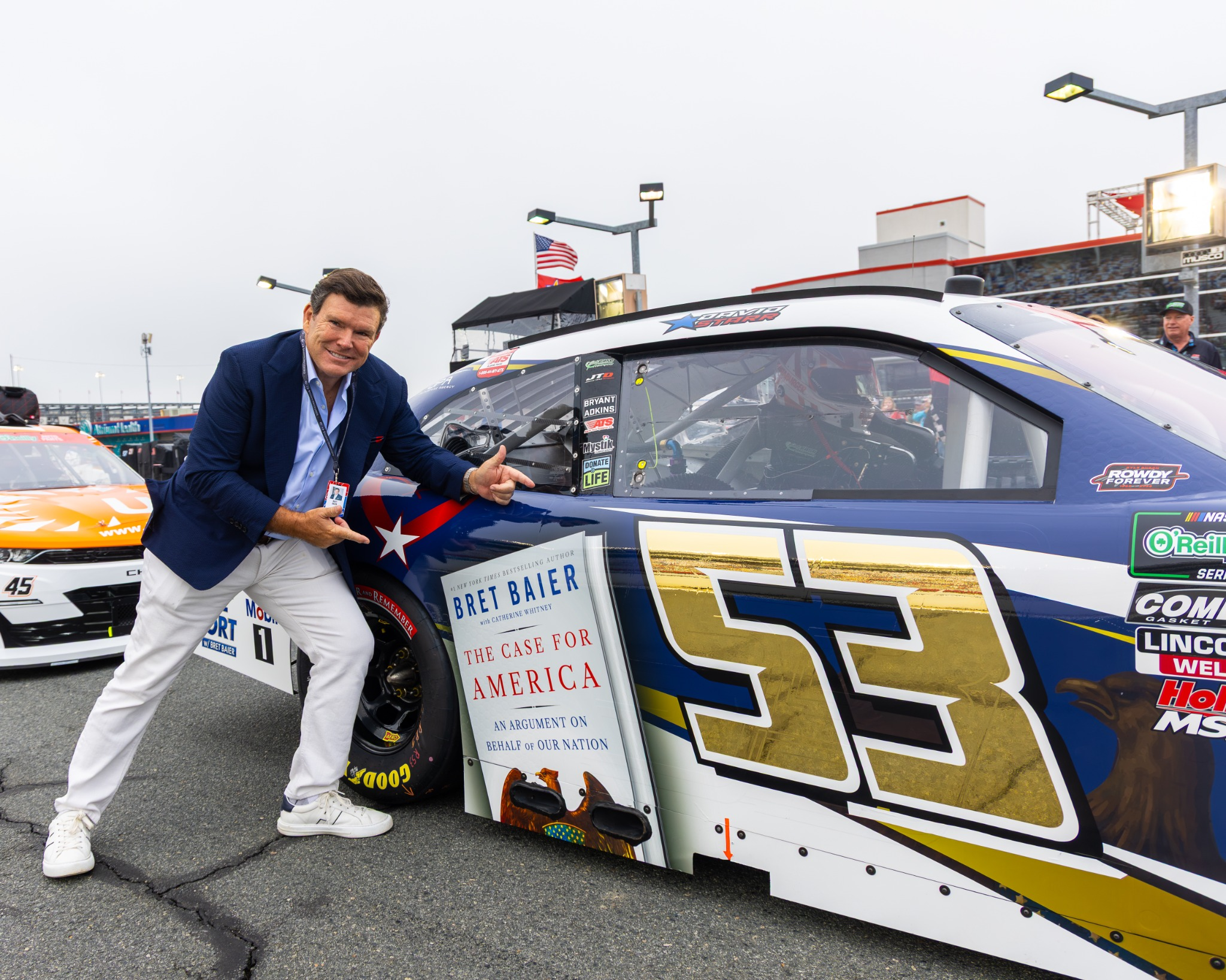 Bret Baier with The Case for America NASCAR campaign car